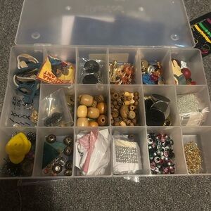 Box of miscellaneous buttons and beads.